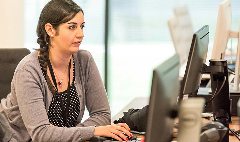 Woman using computer system