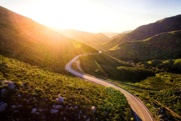 Image shows a winding road, symbolising a journey