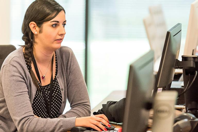 Woman using computer system